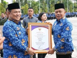 Meranti Cetak Capaian Tertinggi di Riau, Bupati Asmar Terima UHC Award 2025